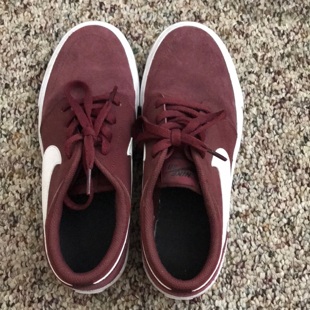 Red suede Nikes